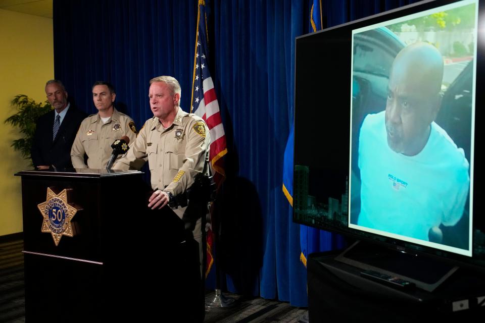 Las Vegas Sheriff Kevin McMahill speaks beside a photo of Duane "Keefe D" Davis during a news conference on an indictment in the 1996 murder of rapper Tupac Shakur on Sept. 29, 2023, in Las Vegas.