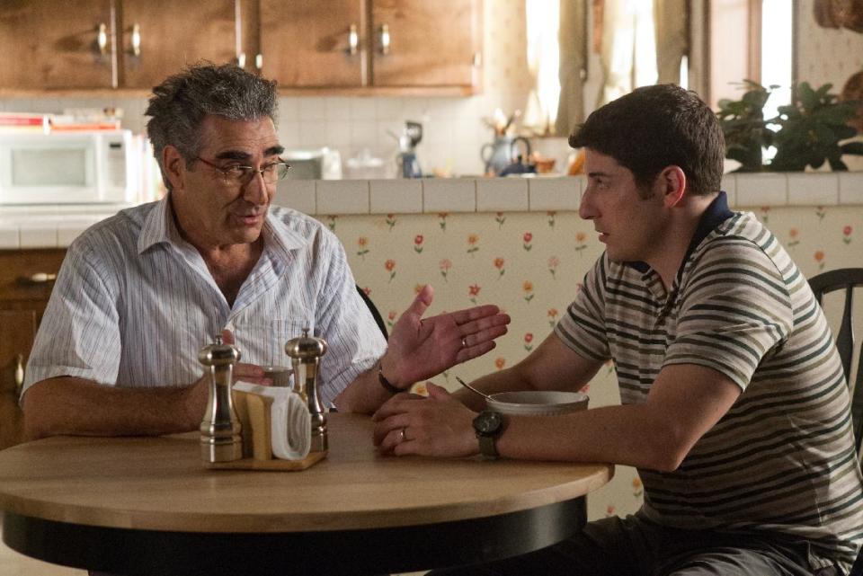 In this image released by Universal Pictures, Eugene Levy, left, and Jason Biggs are shown in a scene from "American Reunion". (AP Photo/Universal Pictures, Hopper Stone)