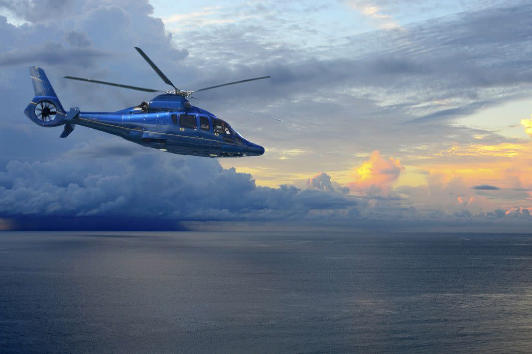 helicopter over ocean