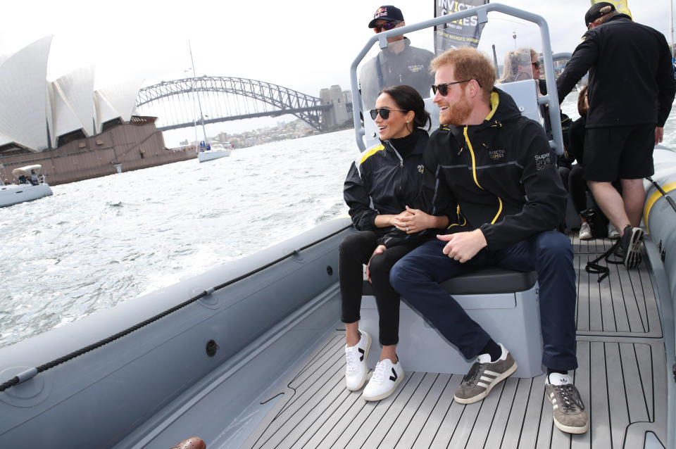 SYDNEY, AUSTRALIA - OCTOBER 21:  Prince Harry, Duke of Sussex and Meghan, Duchess of Sussex on Sydney Harbour looking out at Sydney Opera House and Sydney Harbour Bridge during day two of the Invictus Games Sydney 2018 at Sydney Olympic Park on October 21, 2018 in Sydney, Australia.  (Photo by Chris Jackson/Getty Images for the Invictus Games Foundation)