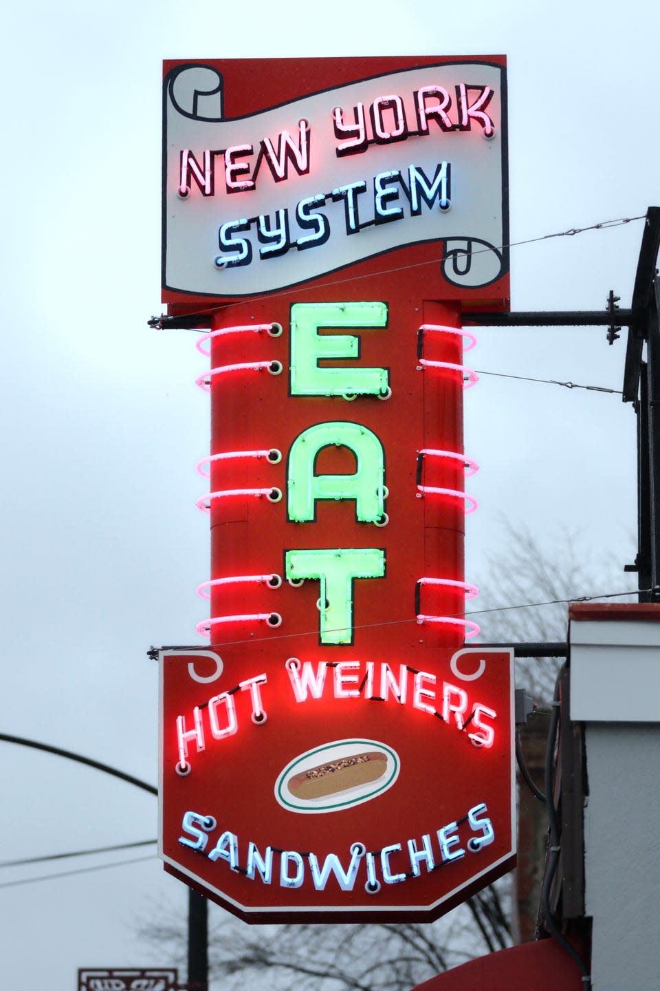 The  Olyneyville New York System sign that went up in 1953. Restaurant owner Greg Stevens said the sign is important to the whole neighborhood so it had to be right.