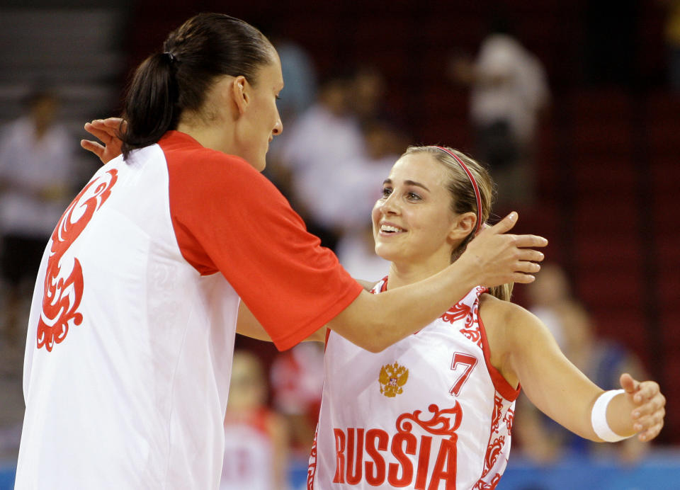 Becky Hammon celebrates with Russian teammates during the 2008 Beijing Olympics. (AP Photo/Eric Gay, File)