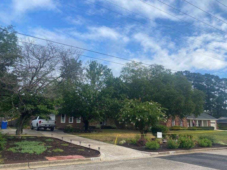 A home on Colgate Drive in Fayetteville was blocked off by police tape on Saturday, July 2, 2022 after officers shot and killed a woman during a struggle for a weapon there the night before.