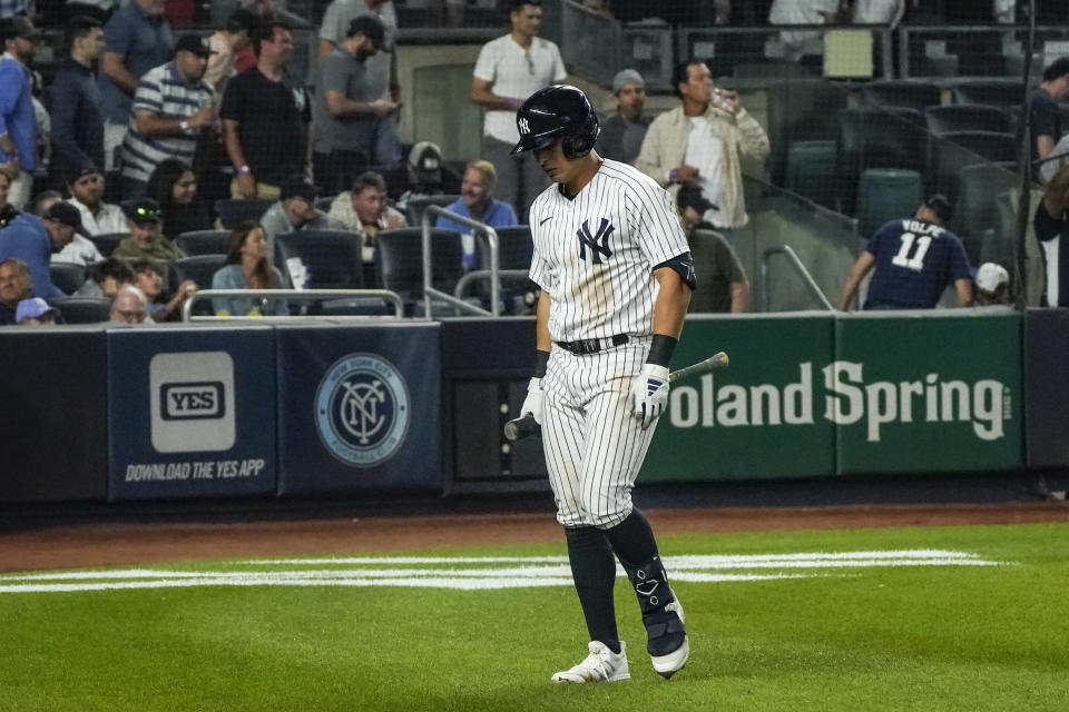 New York Yankees Anthony Volpe leaves the field after he struck out looking in the 10th inning of a baseball game against the Boston Red Sox, Sunday, June 11, 2023, in New York. (AP Photo/Bebeto Matthews)