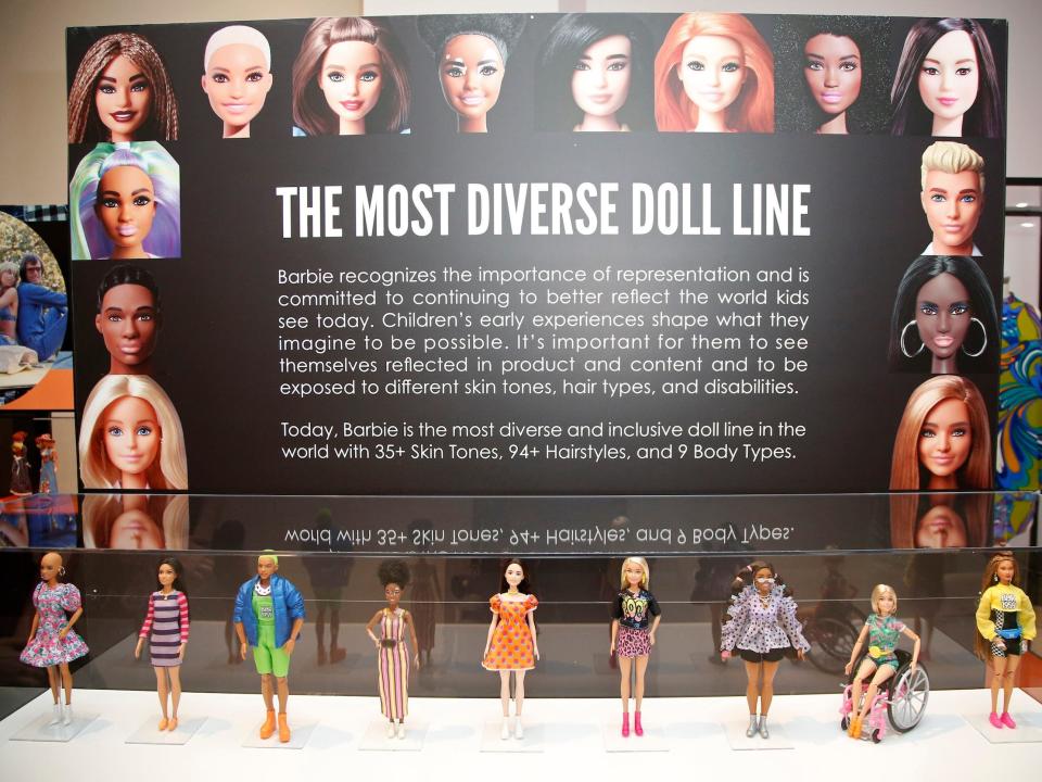 A display of diverse Barbies in 2023.