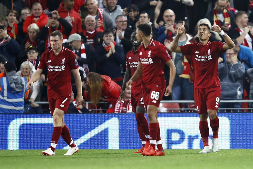 Roberto Firmino celebrates his winner for Liverpool vs. PSG in the Champions League. (Getty)