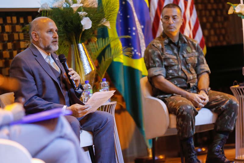 United States Agency for International Development Deputy Administrator for Latin America and the Caribbean, John Barsa speaks near Brazilian Army Colonel George Feres Kanaan during a ceremony to announce a new Venezuelan integration program in Brazil, in