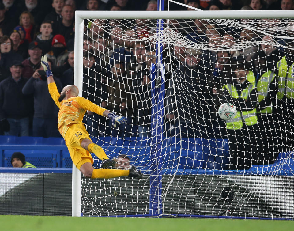 LONDON, ENGLAND - OCTOBER 30: Willy Caballero of Chelsea cannot stop Marcus Rashford of Manchester United scoring their second goal during the Carabao Cup Round of 16 match between Chelsea FC and Manchester United at Stamford Bridge on October 30, 2019 in London, England. (Photo by John Peters/Manchester United via Getty Images)