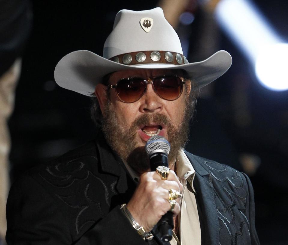 FILE - This May 12, 2011 file photo shows singer Hank Williams Jr. performs during the CMT Disaster Relief Concert in Nashville, Tenn. Williams latest album, "Old School, New Rules," will be released on Tuesday, July 10, 2012. The 12-song record features guest appearances from Merle Haggard and Brad Paisley. (AP Photo/Wade Payne, file)