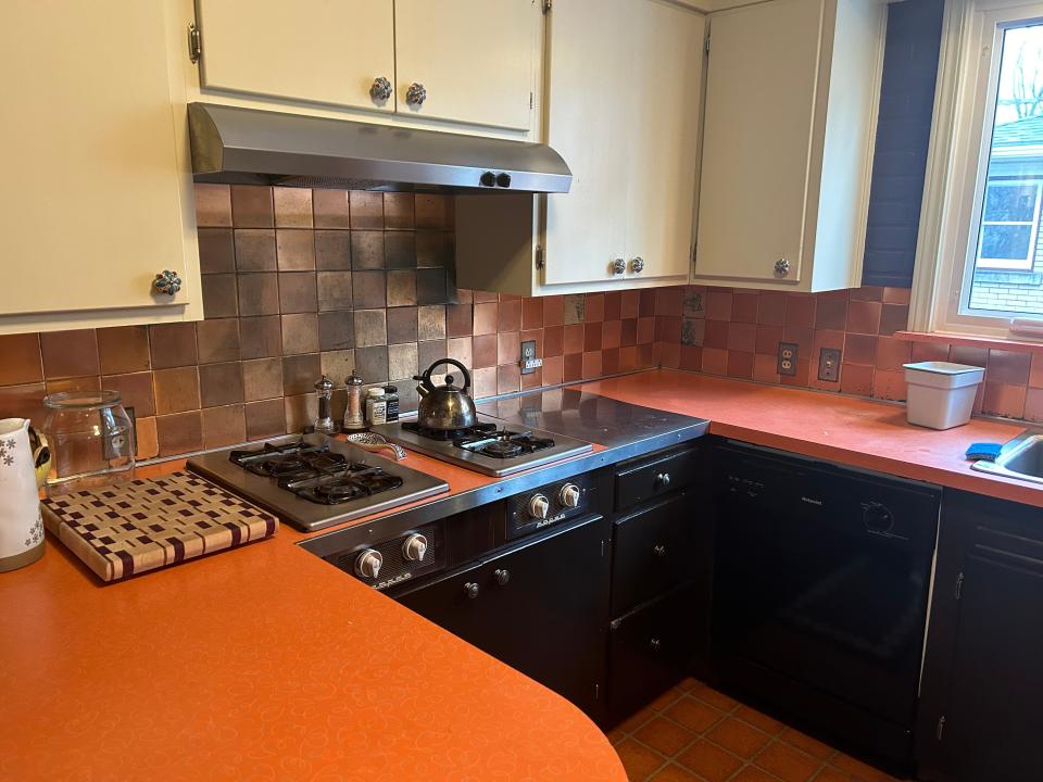 Holly Christensen's kitchen before a recent renovation with a Roper stovetop.