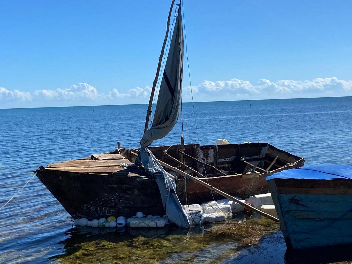 A steel-hulled, makeshift migrant sailboat is grounded near the mangroves of Harry Harris Park in the Upper Keys area of Tavernier Tuesday, Jan. 10, 2023. Florida Fish and Wildlife Conservation Commission officers found the boat adrift off Key Largo earlier that day.