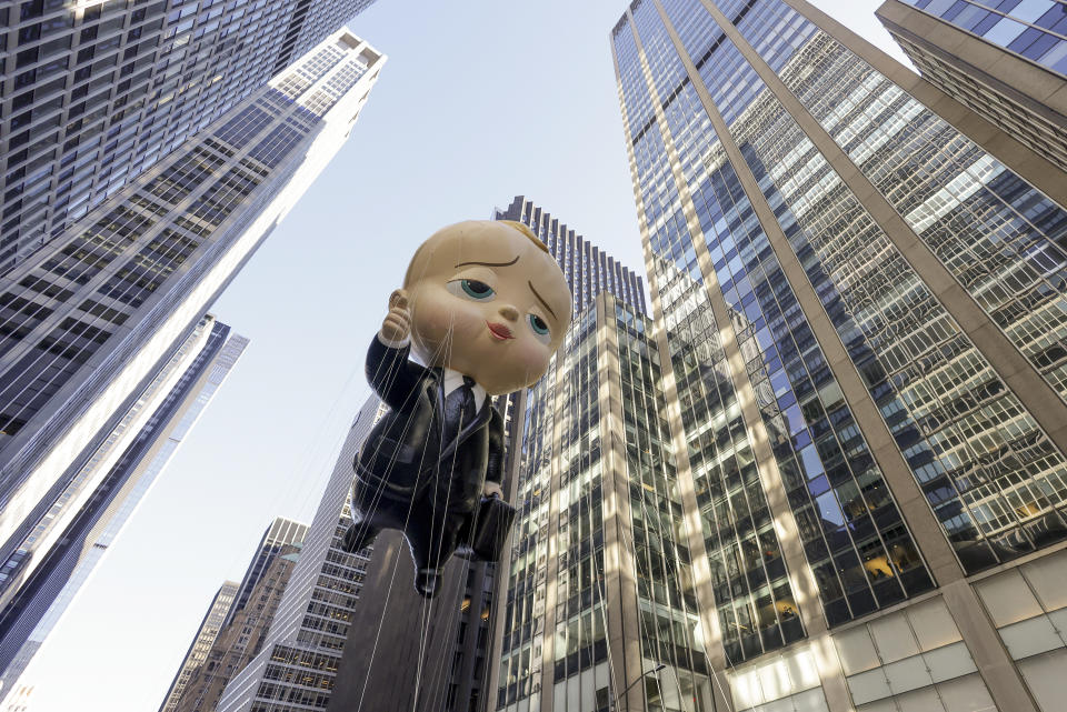 The Boss Baby balloon makes its way down Sixth Avenue during the Macy's Thanksgiving Day Parade, Thursday, Nov. 24, 2022, in New York. (AP Photo/Jeenah Moon)