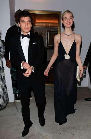 <p>Rachpoot/Bauer-Griffin/GC Images</p> Gus Wenner and Elle Fanning at Vas Morgan and Michael Braun's Golden Globe Awards Party on Jan. 7, 2024