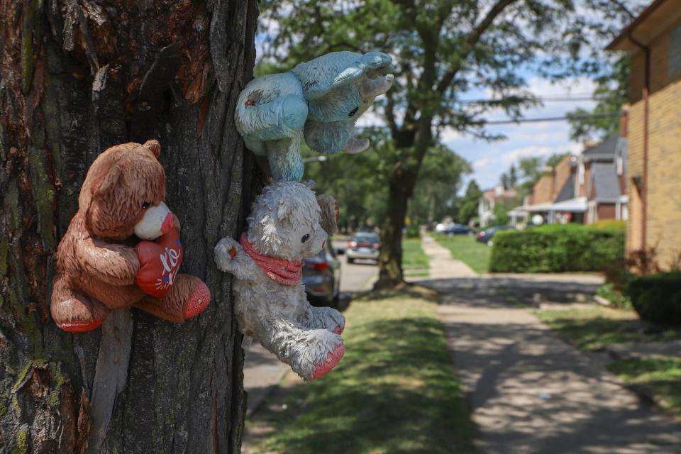 A makeshift memorial Sunday on Coyle Street in Detroit where one person was killed and seven other wounded in a mass shooting overnight at a party.