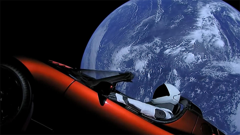 The first flight of a Falcon Heavy in 2018 boosted a Tesla Roadster into space as a demonstration, providing stunning views of a spacesuited mannequin in the driver's seat with Earth as a backdrop. / Credit: SpaceX