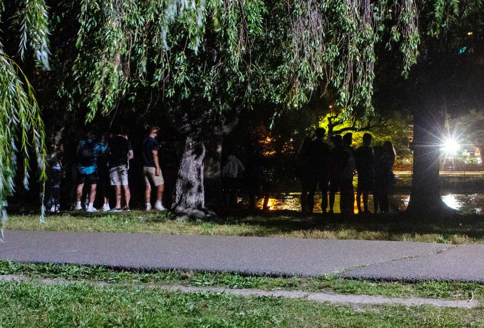 Boston University and Northeastern University students gather on the Charles River Esplanade in Boston on Sept. 4, 2020.