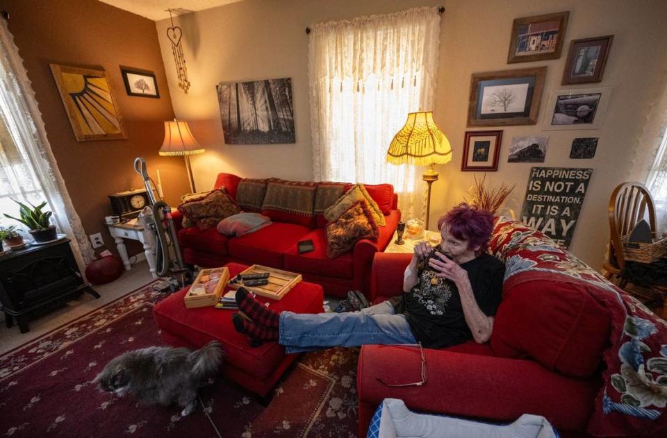 After working the 2 a.m. shift at a nearby Casey’s, Wanda Riedhart, 70, enjoyed a cup of coffee at her $760 per month Clearview Village apartment, a World War II-era housing complex that has been her home for 12 years. “I think I lucked out,” Riedhart said. “I have a great apartment. I have great friends that live right close. There’s nothing around.” Tammy Ljungblad/tljungblad@kcstar.com