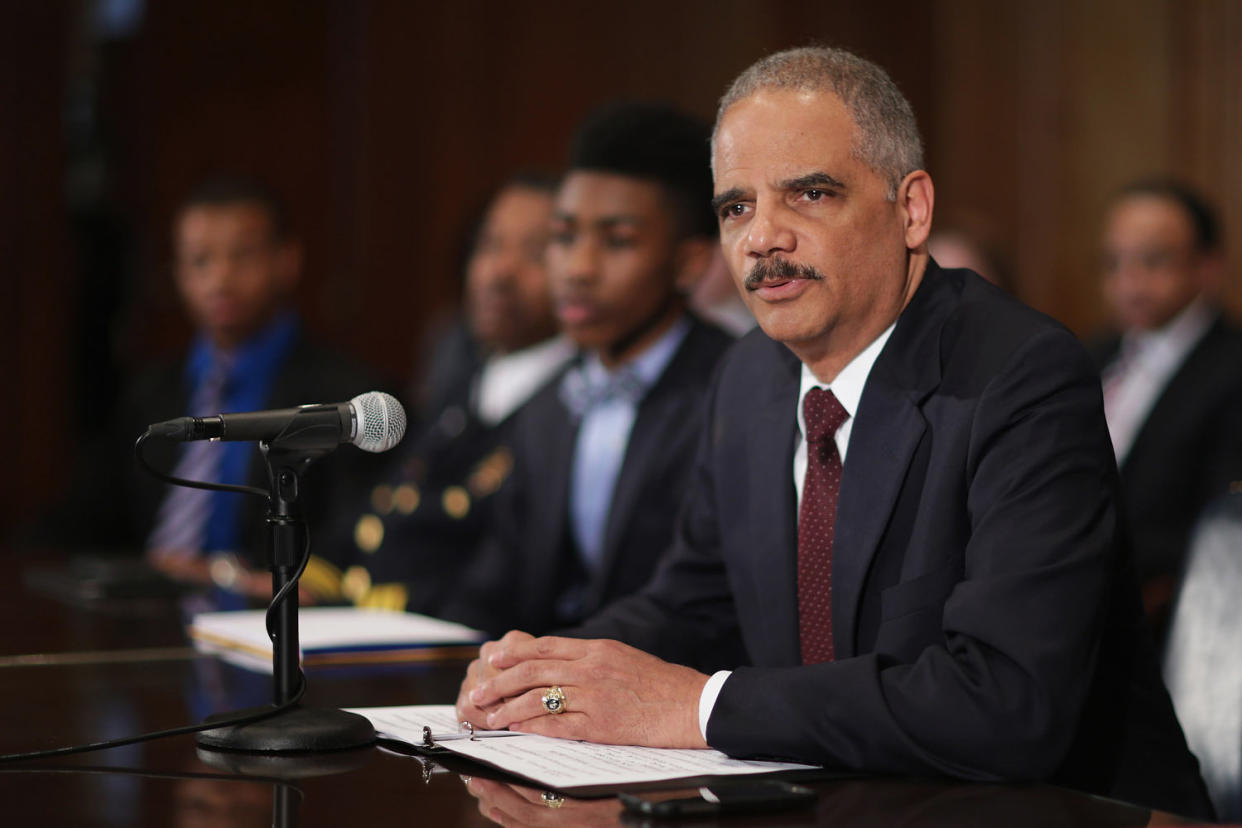 Eric Holder delivers remarks at the Department of Justice (Chip Somodevilla / Getty Images file)