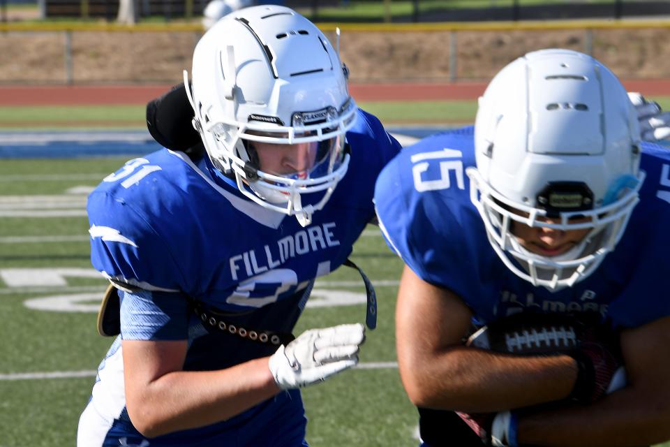 Fillmore High's Tory Cabral (left) was named the Defensive Player of the Year for the Citrus Coast League.