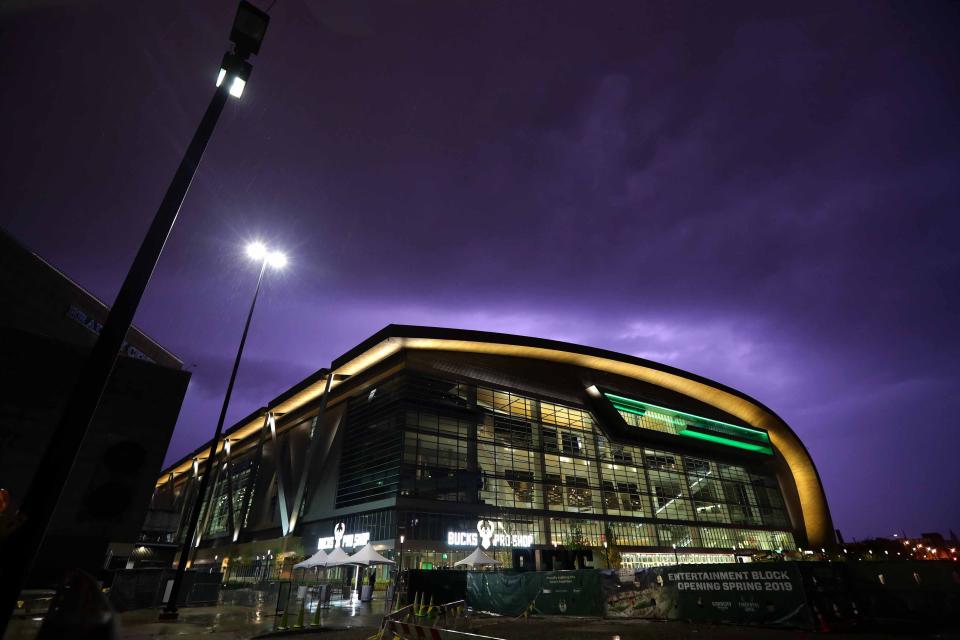 Lightning flashes above the Fiserv Forum, the home of the Milwaukee Bucks, on August 26, 2018.