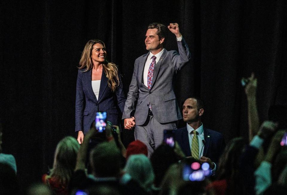 Florida Congressman Matt Gaetz, who recently triggered a historic vote to remove Republican Kevin McCarty as Speaker of the House, and his wife Ginger Gaetz greet the crowd as former President Donald Trump introduced them at an event hosted by the pro-Trump Club 47 USA, at the Palm Beach County Convention Center on Wednesday, October 11, 2023.