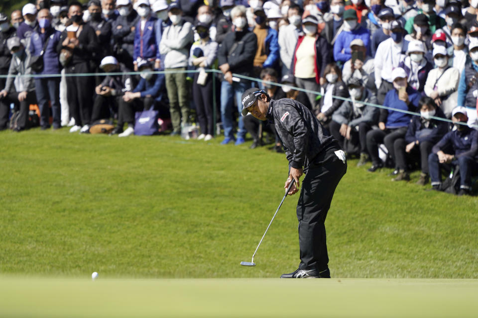 Hideki Matsuyama of Japan putts on the first green during the third round of the Zozo Championship golf tournament at Accordia Golf Narashino Country Club on Saturday, Oct. 23, 2021 in Inzai, Chiba Prefecture, Japan. (AP Photo/Tomohiro Ohsumi)