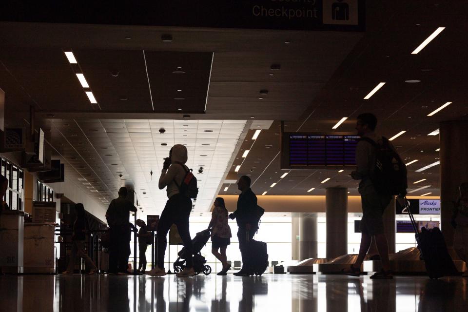 Travelers walk to security at the Salt Lake City International Airport in Salt Lake City on Friday, May 19, 2023. | Ryan Sun, Deseret News