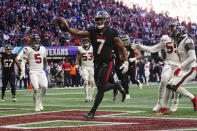 Atlanta Falcons running back Bijan Robinson (7) scores a touchdown in the second half of an NFL football game against the Houston Texans in Atlanta, Sunday, Oct. 8, 2023. (AP Photo/John Bazemore)