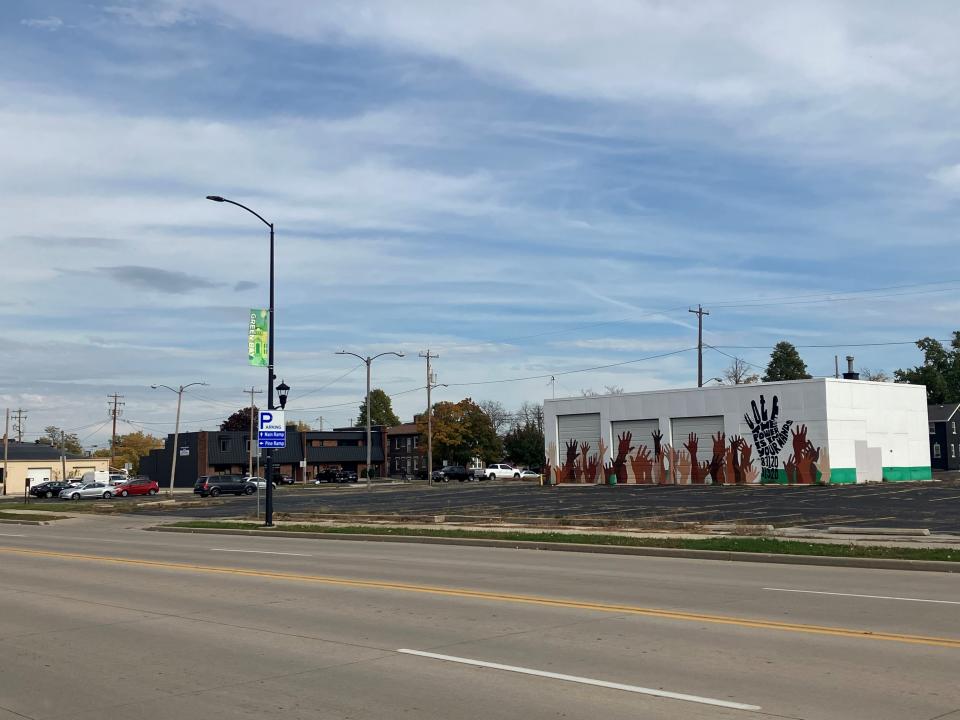 A developer continues to redesign plans to build 172 market rate apartments on what is currently a city-owned parking lot in the 200 block of North Monroe Avenue in downtown Green Bay