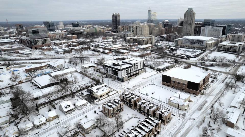 Several inches of snow blankets downtown Raleigh Saturday morning, Jan. 22, 2022.