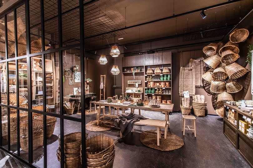 Søstrene Grene is opening one of its Scandi-inspired stores in Tunbridge Wells - its first store in Kent - inside, it is low lighting, lots of wooden shelving, and nice brown colour shades throughout - a rustic feel
