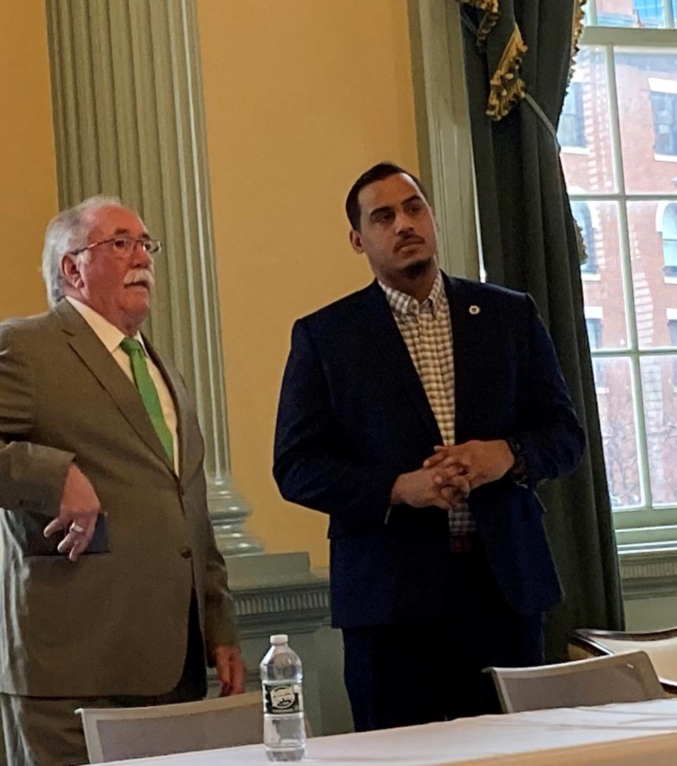 Reps. James O'Day, D-West Boylston and Manny Cruz, D-Salem, argue for keeping young adults accused of crime within the Massachusetts juvenile justice system through age 20 at a legislative briefing Wednesday on the proposal.