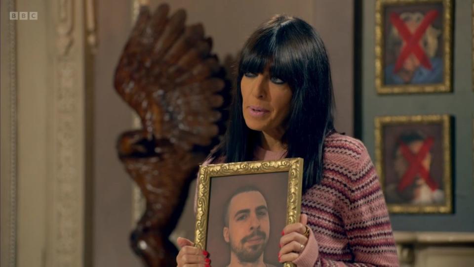 the traitors series 2 claudia winkleman holding up zack's portrait