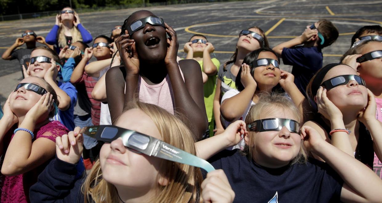 Solar eclipses don't come around often, but make sure to view these rare events with eclipse glasses to protect your vision. <a href="https://newsroom.ap.org/detail/USEclipseSchools/0f2e25e7620440c0be042b6516d1acde/photo?Query=eclipse%20viewing&mediaType=photo&sortBy=&dateRange=Anytime&totalCount=524&digitizationType=Digitized&currentItemNo=18&vs=true&vs=true" rel="nofollow noopener" target="_blank" data-ylk="slk:AP Photo/Charlie Riedel;elm:context_link;itc:0;sec:content-canvas" class="link ">AP Photo/Charlie Riedel</a>