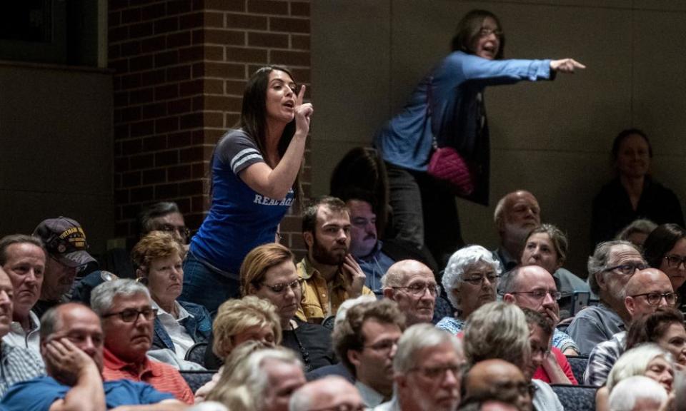 Trump supporters heckle Amash in Grand Rapids last month.