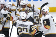 Vegas Golden Knights goaltender Logan Thompson (36) is congratulated after defeating the Boston Bruins 4-3, following a shoot out during an NHL hockey game, Monday, Dec. 5, 2022, in Boston. (AP Photo/Charles Krupa)