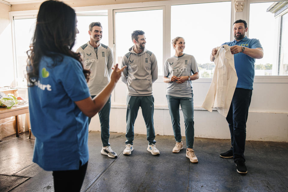 Anderson, second left, and other England cricketers surprised Leicester Electricity Sports Cricket Club during an inter-squad friendly game (LV= Insurance handout/PA)