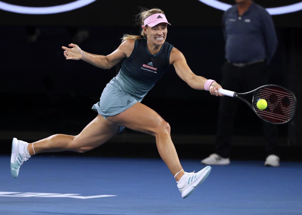 Germany's Angelique Kerber makes a forehand return to Australia's Kimberly Birrell during their third round match at the Australian Open tennis championships in Melbourne, Australia, Friday, Jan. 18, 2019. (AP Photo/Kin Cheung)