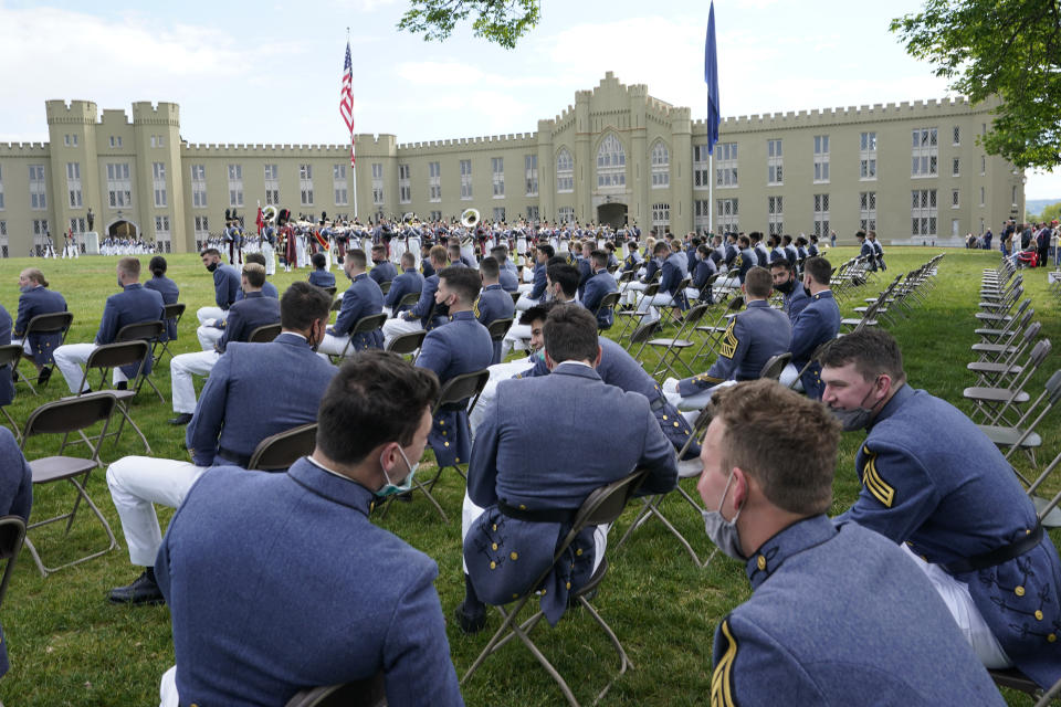 Virginia Military Institute class of 2021 watch during a change of command parade and ceremony on the parade grounds at the school in Lexington, Va., Friday, May 14, 2021. Kasey Meredith was installed as the first female to lead the Virginia Military Institute's Corps of Cadets in its 182 year history. (AP Photo/Steve Helber)