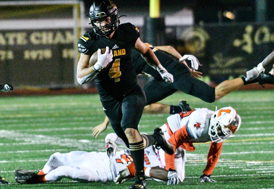 Bridger Koby of Merritt Island Mustangs runs for a touchdown during the game against Leesburg Nov. 12, 2021. Craig Bailey/FLORIDA TODAY via USA TODAY NETWORK