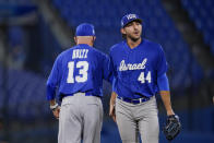 Israel pitcher Zachary Weiss walks off the mound during the seventh inning a baseball game against South Korea at the 2020 Summer Olympics, Thursday, July 29, 2021, in Yokohama, Japan. (AP Photo/Sue Ogrocki)