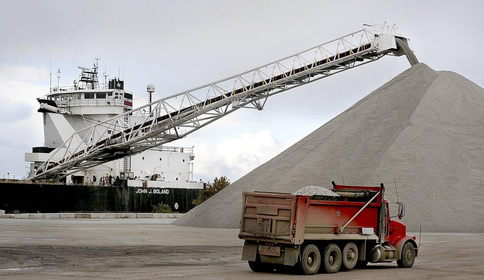 In this file photo, gravel is unloaded by conveyor belt from the John J. Boland on Oct. 21, 2010, at the Carmeuse Lime & Stone/Erie Sand & Gravel docks on Erie's east bayfront. The Great Lakes freighter unloaded 16,000 tons of aggregate from quarries in Cedarville, Ohio. Retired engineer William R. Miller says the Erie region should tap its gravel resources to develop promising new concrete technology.