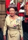 <p>Margaret arrives at the State Opening of Parliament wearing a baby yellow dress and a show-stopping tiara on May 14, 1997. </p>