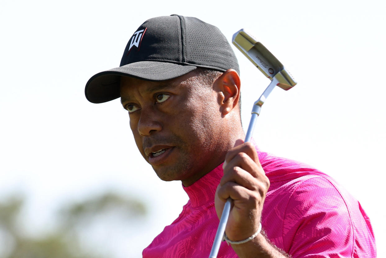 Golf - The Masters - Augusta National Golf Club - Augusta, Georgia, U.S. - April 7, 2022 Tiger Woods of the U.S. reacts on the 18th green after finishing the first round REUTERS/Mike Blake