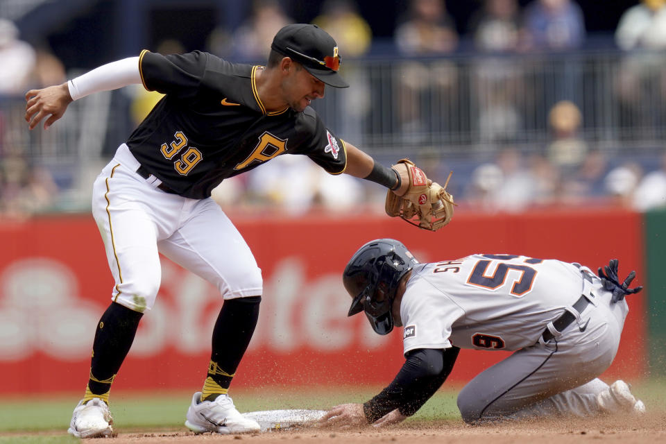 Detroit Tigers' Zack Short steals second base safely against Pittsburgh Pirates second baseman Nick Gonzales in the fourth inning of a baseball game in Pittsburgh, Wednesday, Aug. 2, 2023. (AP Photo/Matt Freed)