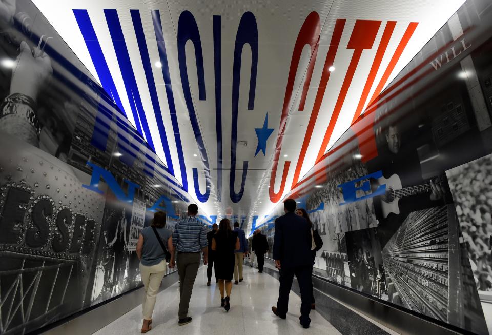 The Nashville International Airport unveiled the history of Music City told in black and white photographs in the exit hallway at its new International Arrivals Facility baggage claim and U.S. Customs area on Monday, Sept. 25, 2023, in Nashville, Tenn.