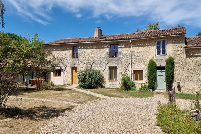 Liz and David used the cash to buy six 400-year-old houses, two barns and three-acres of land -Credit:Liz Murphy / SWNS