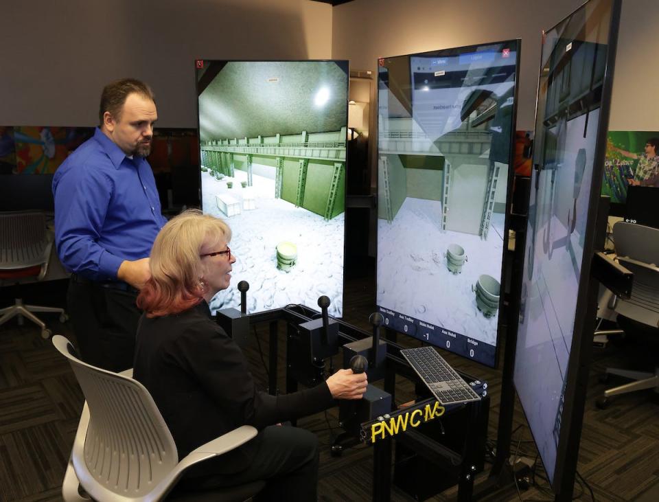 U.S. Department of Energy's Geri Richmond uses technology at Purdue Northwest University's Center for Innovation through Visualization and Simulation. The DOE recently awarded the center $7.1 million for its efforts in decarbonizing the steel industry.