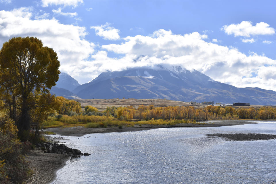 FILE - In this Oct. 8, 2018, file photo, Emigrant Peak is seen rising above the Paradise Valley and the Yellowstone River near Emigrant, Mont. A senate panel deadlocked Thursday, July 22, 2021, on the Biden administration's nominee Tracy Stone-Manning to oversee roughly 250 million acres of public lands as director of the U.S. Bureau of Land Management. (AP Photo/Matthew Brown, File)