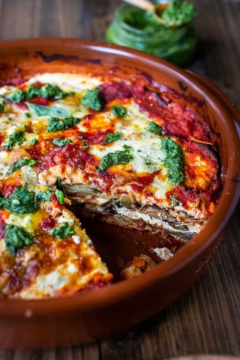 Roasted eggplant parmesan with basil pesto.